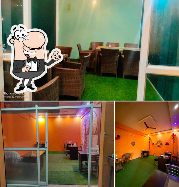 Take a seat at one of the tables at Garhwali tadka