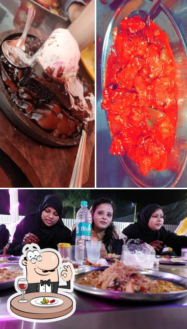 Take a look at the photo showing food and dining table at Mohammed Ali restaurant nizampur