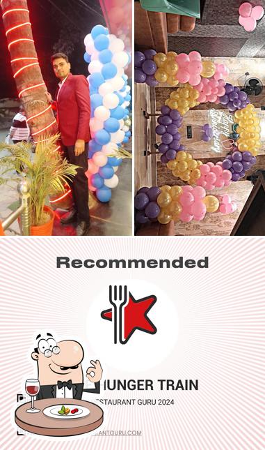 Check out the picture depicting food and exterior at The Hunger Train Restaurant