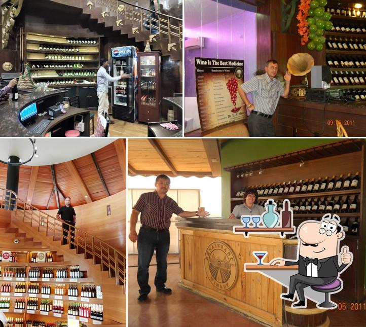 Take a seat at one of the tables at Milestone Restaurant And Wine LOUNGE (formerly Renaissance) , Ozar