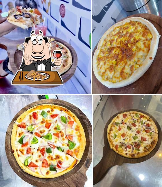 Pick pizza at Lalbaugkar Juice And Snacks Corner