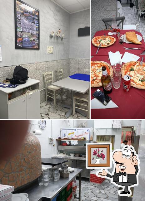 Dai un'occhiata agli interni di Pizzeria Napoli Centro