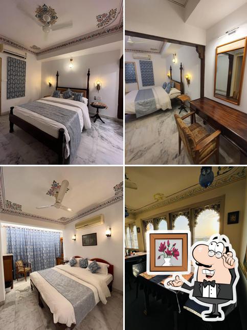 Take a seat at one of the tables at Mewar Haveli - At Lake Pichola