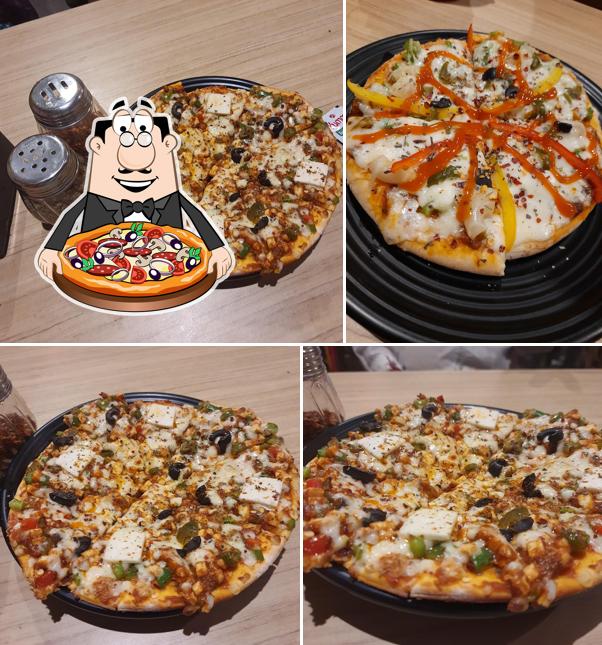 Try out pizza at Food Villa