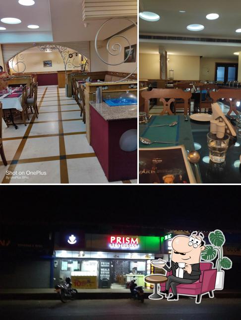 Take a seat at one of the tables at Paris Multi Cuisine Restaurant