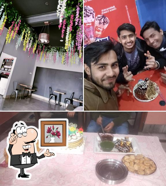 Check out the picture showing interior and food at TIJA COFFEE CAFE