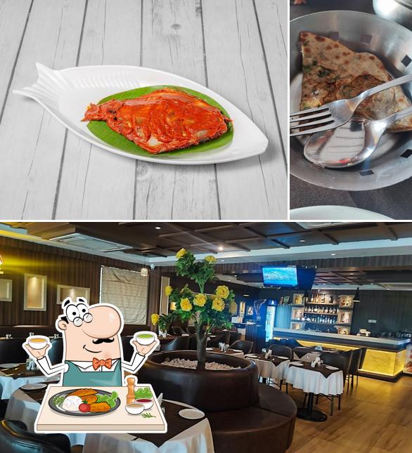 Check out the image depicting food and interior at Kudla Delight - Best Seafood Restaurant in Bangalore