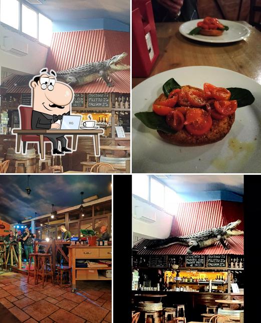 Siediti a un tavolo di Dundee pub pizzeria
