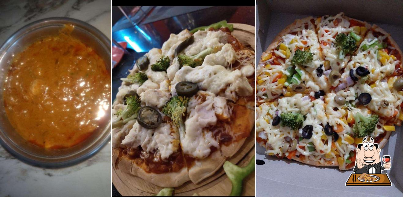 Pick pizza at V Grand Restaurant