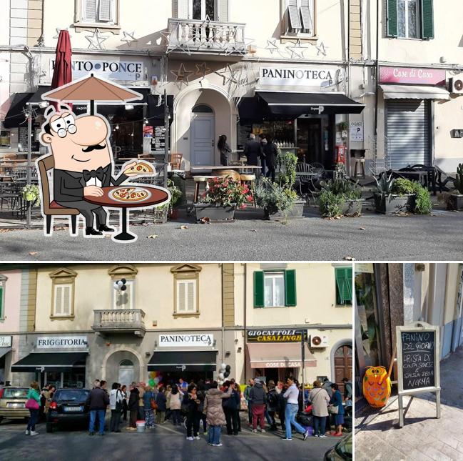 Questa è la immagine che mostra la esterno e lavagna di Il Punto Panino