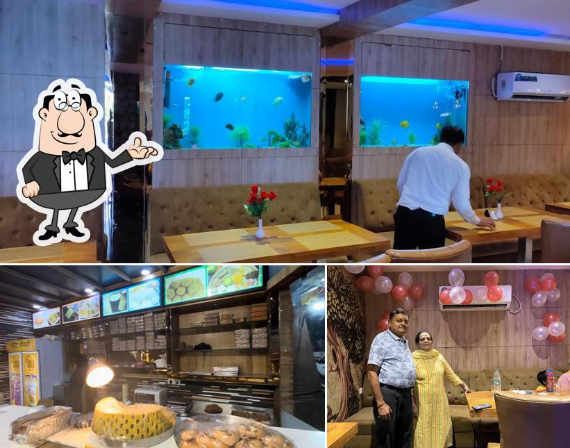 This is the image showing interior and beverage at Namaste Restaurant - Opp. Prem Mandir, Vrindavan