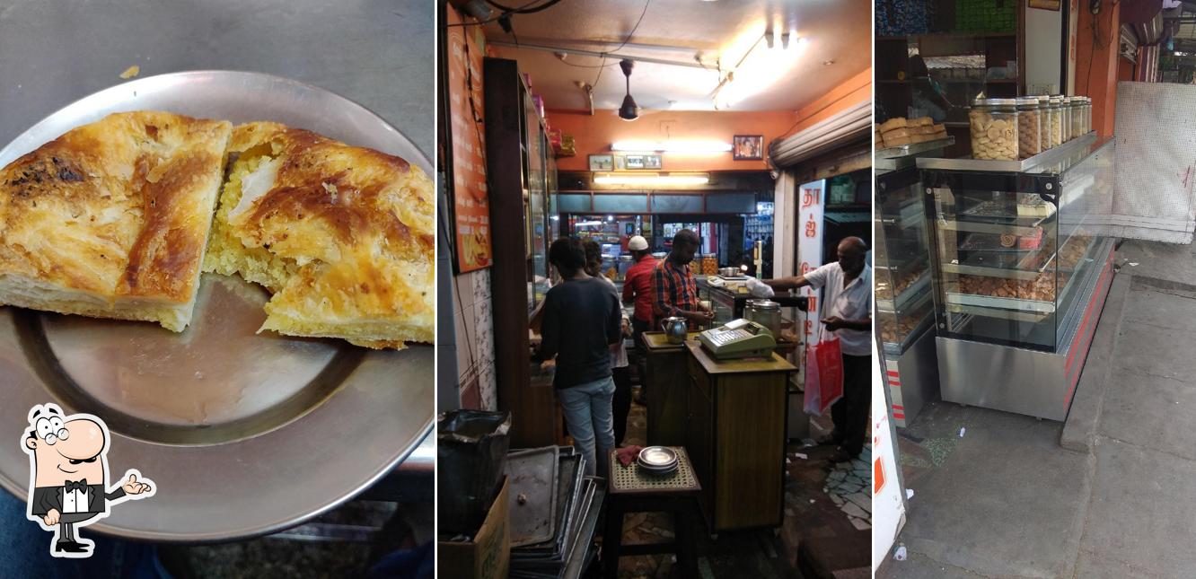 Take a seat at one of the tables at Taj Tea Stall