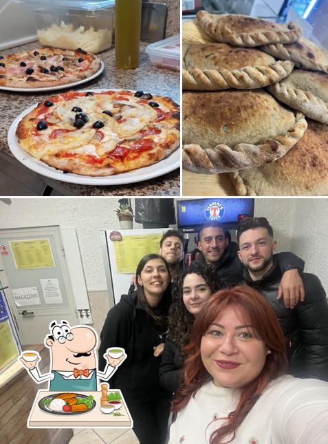 Tra le varie cose da Pizzeria la Baracca si possono trovare la cibo e interni