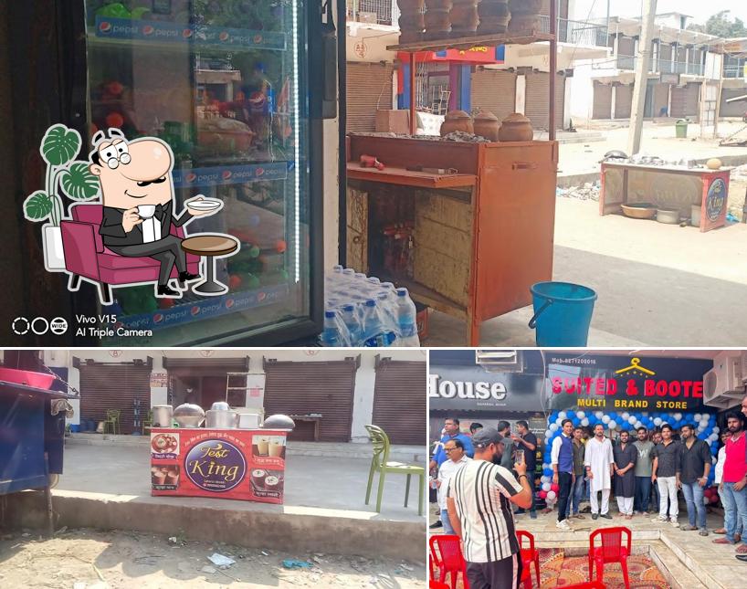 Take a seat at one of the tables at Champaran Handi mutton& chicken DB.Rod saharsa