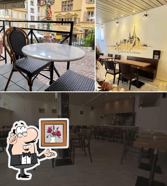 Siediti a un tavolo di Crêperie du Château Sàrl