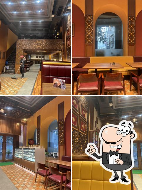 Take a seat at one of the tables at Sagar Ratna Take a seat at one of the tables at Sagar Ratna