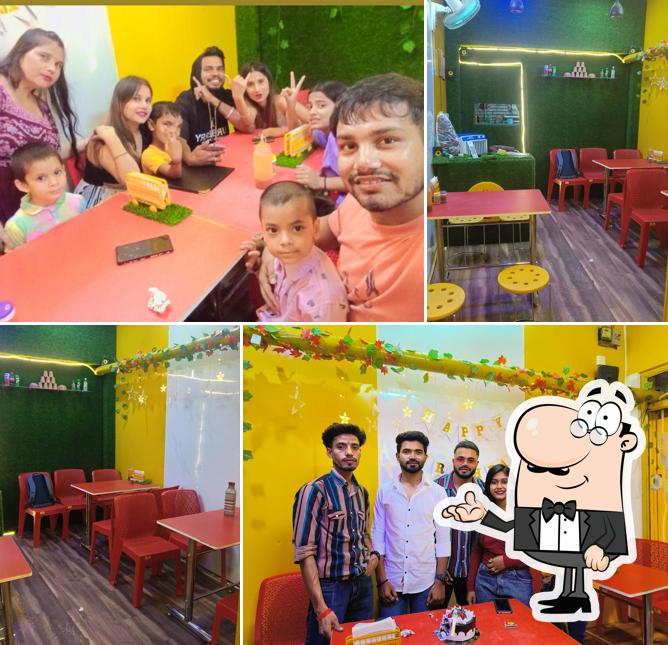 Take a seat at one of the tables at Wat A Maggi - The Taste of Love