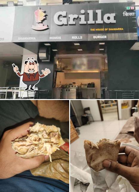 This is the photo showing food and interior at Grilla The House Of Shawarma
