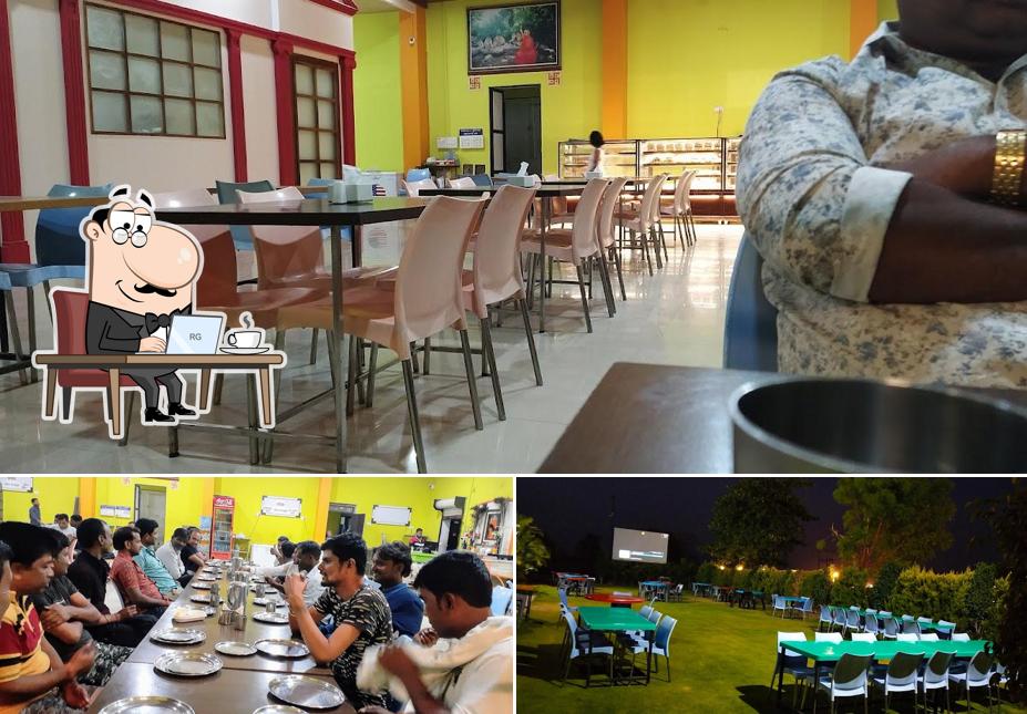 Take a seat at one of the tables at Hotel Shree Hari Pandurang