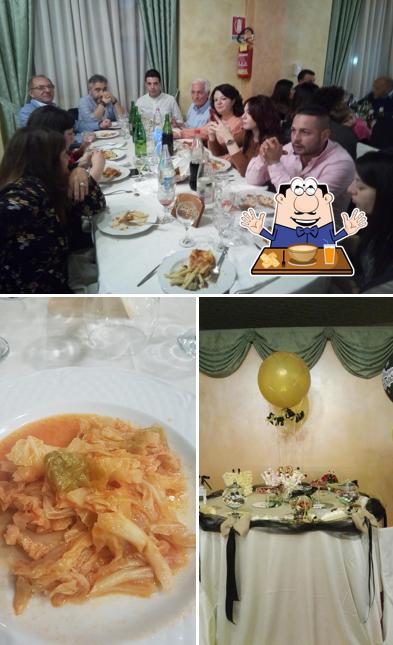 La foto di cibo e tavolo da pranzo da L'amicone Sala Ricevimenti