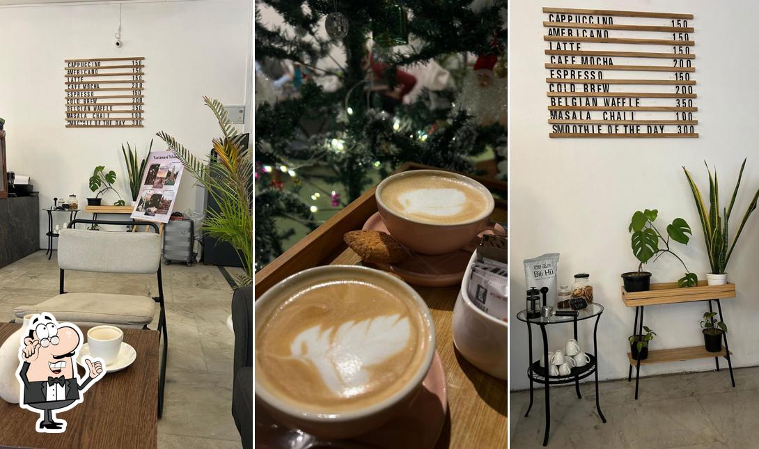 Take a seat at one of the tables at Cafe Fika by POSHTEL