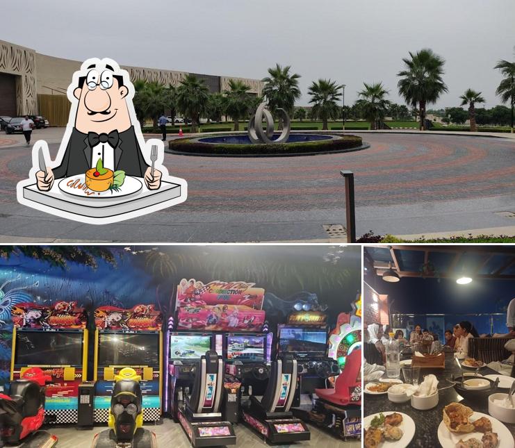 Check out the picture displaying food and exterior at Four A Resort