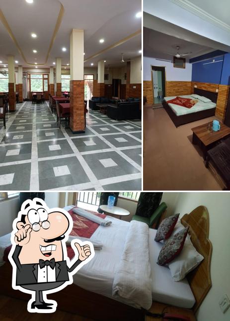 Take a seat at one of the tables at Hotel Beas Valley & Restaurant