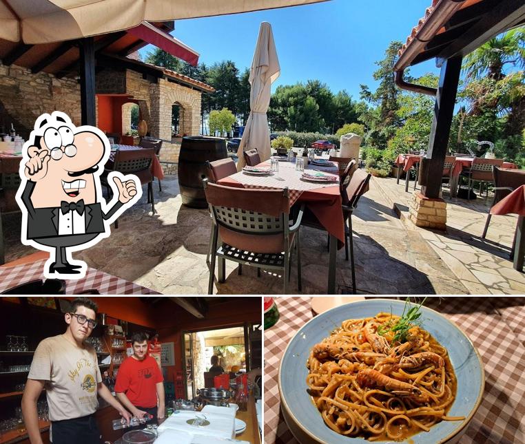La foto della interni e cibo di Tri Palme