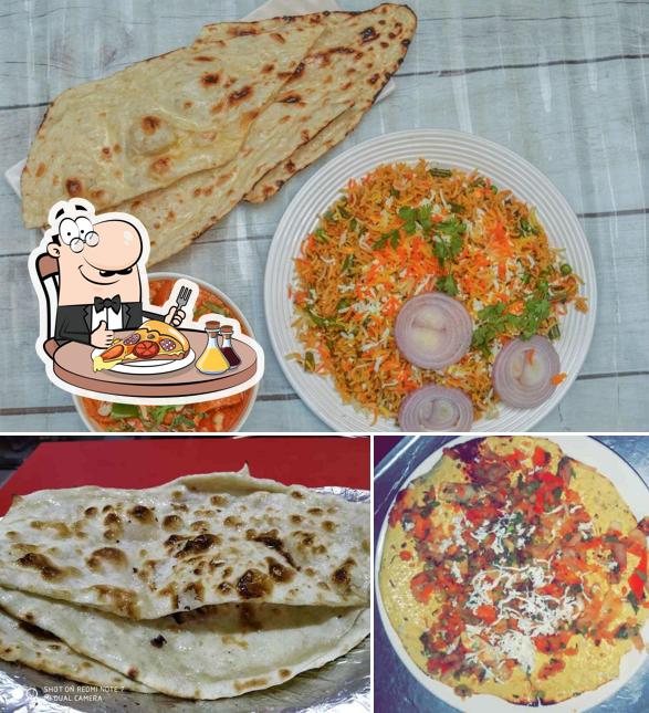 Pick pizza at Zaika Restaurant Greater Noida