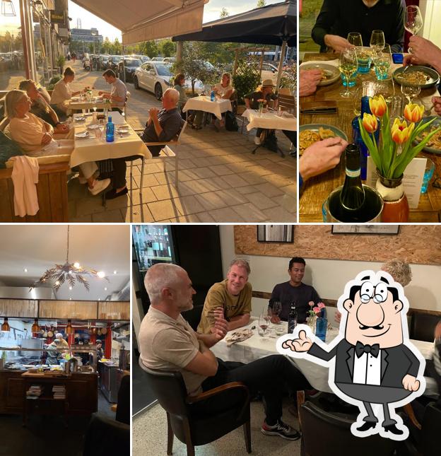 Take a seat at one of the tables at Cucina Casalinga - cucina italiana