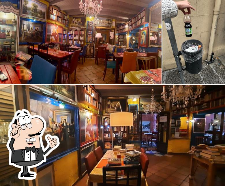 La foto della interni e bevanda di Pizzeria Art Libri Totó