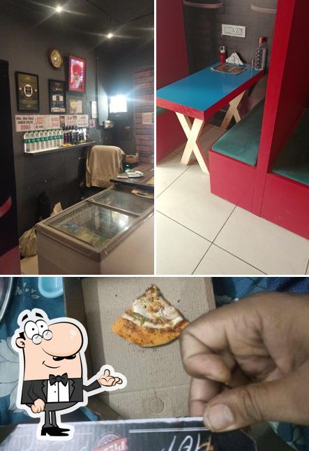Among various things one can find interior and food at PIZZA