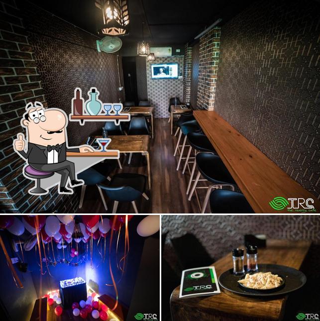 This is the photo showing interior and food at TRC The Reality Cafe