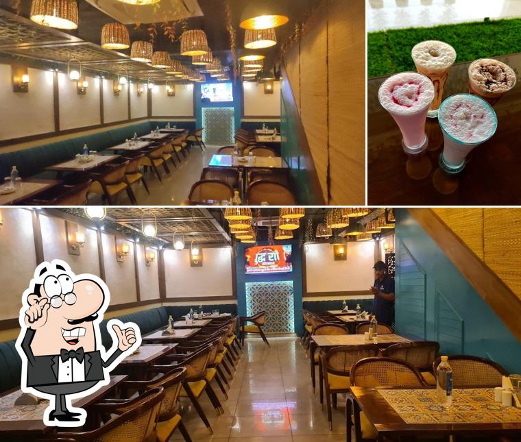 The photo of Sohbat Indian Restaurant’s interior and beverage