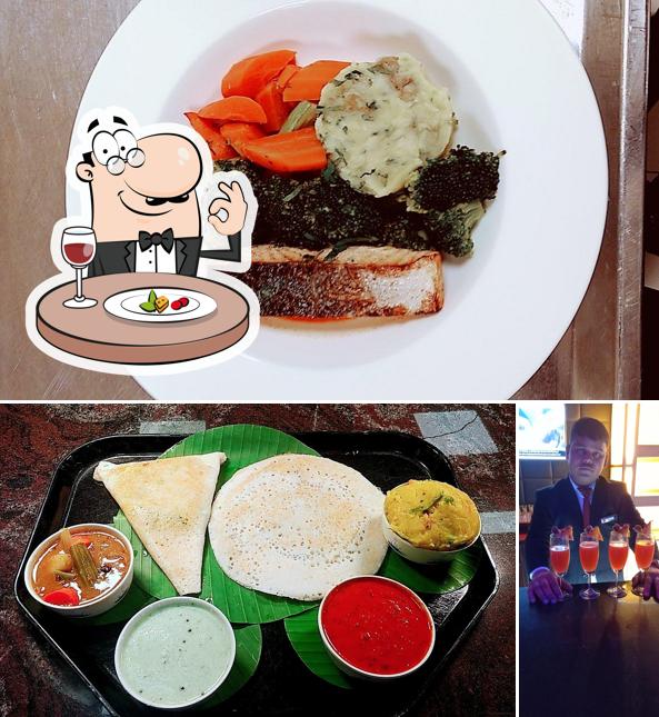 This is the image depicting food and bar counter at The Bridge Restaurant by Clarks Inn