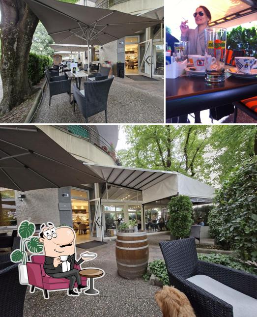 Dai un'occhiata agli interni di Atmosphere Boutique Cafe