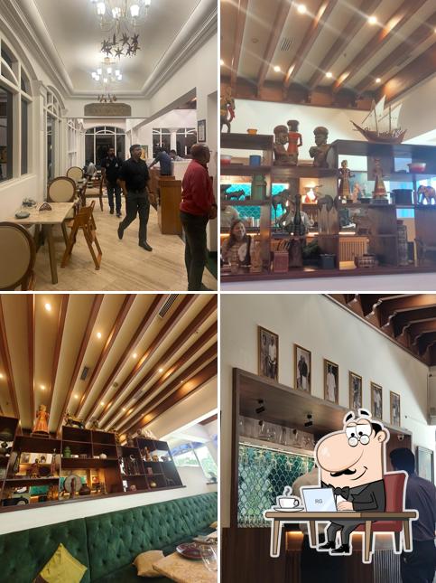 Take a seat at one of the tables at Restaurant Chef Pillai Kochi