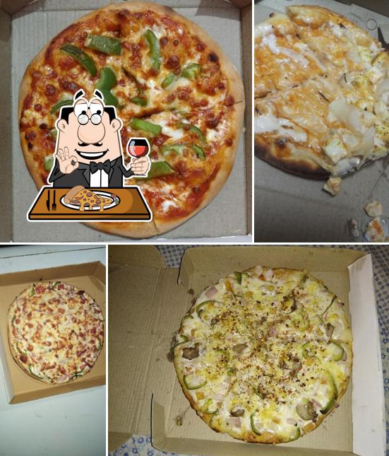 Get pizza at Munchy Bites