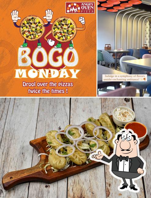 Among different things one can find interior and beverage at Angry Oven Pizza