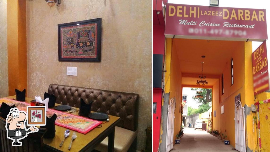 Take a seat at one of the tables at Delhi Lazeez Darbar
