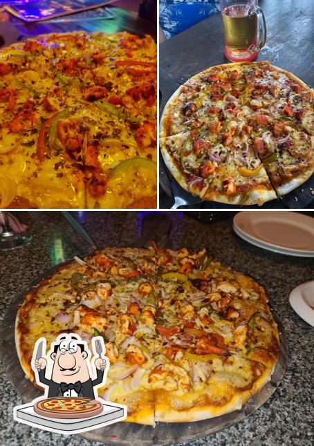 Try out pizza at Blue Waters Bar And Restaurant