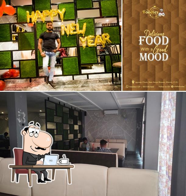 The interior of The Foodies cafe & restaurant Kharsia