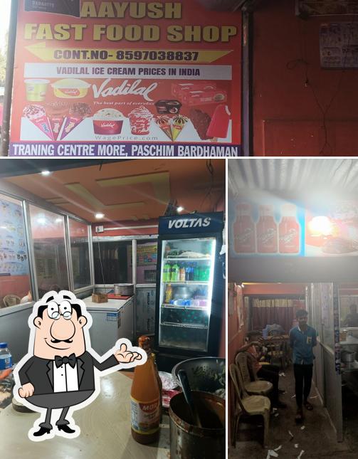 This is the photo displaying interior and food at AAyush Fast Food