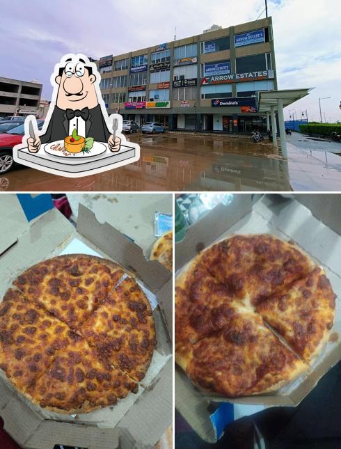 The photo of food and exterior at Domino's Pizza Aero Arcade, Mohali