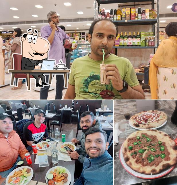 Among different things one can find interior and pizza at Punjabi Lahore Dhaba