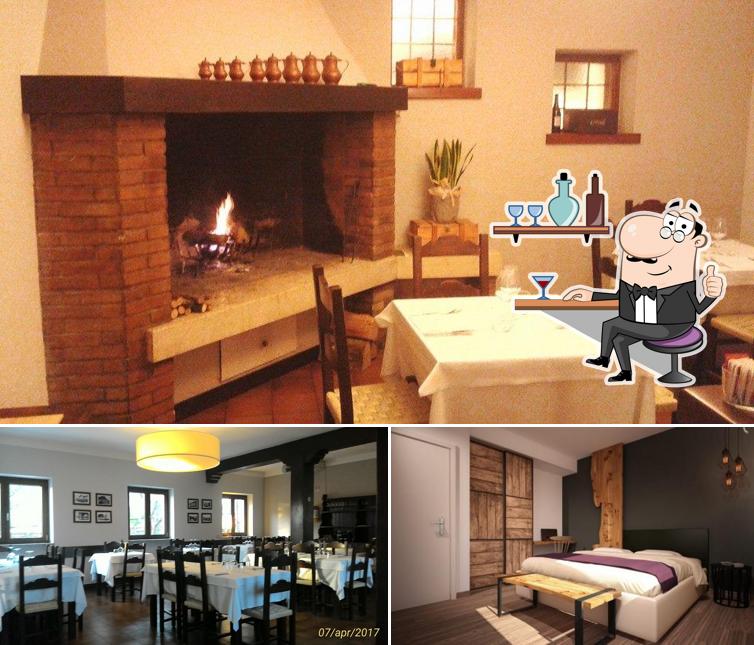 Dai un'occhiata agli interni di Hostaria La Cross