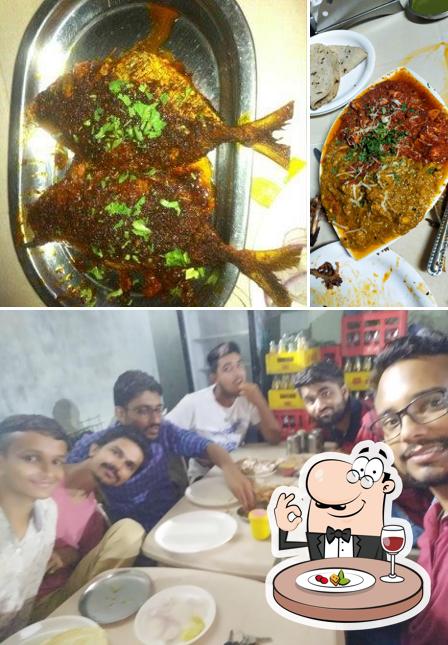 This is the picture displaying food and interior at Royal Tawa Fry