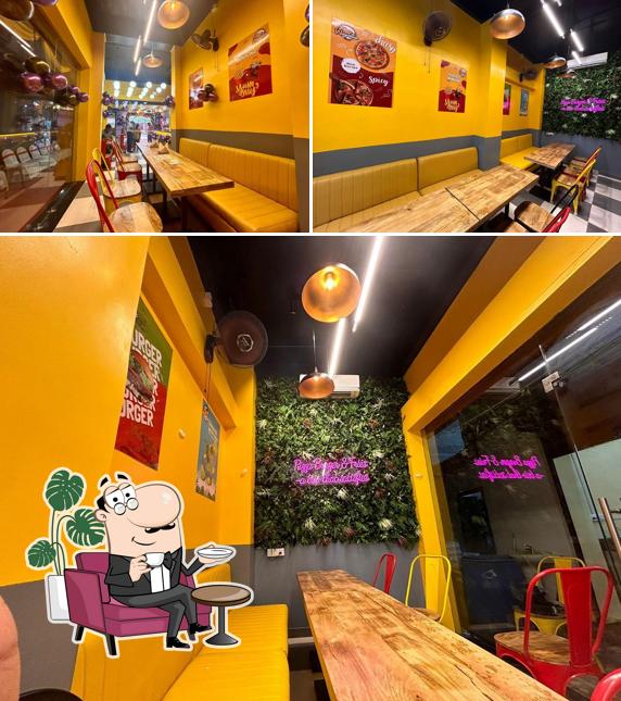 Take a seat at one of the tables at Wrapchick Pizza