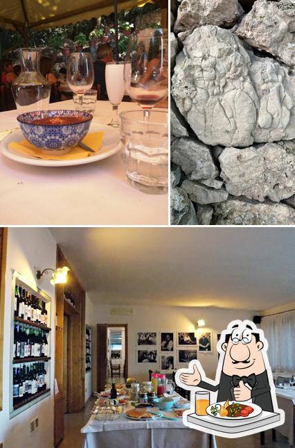Coop Turistica Enis si caratterizza per la cibo e tavolo da pranzo