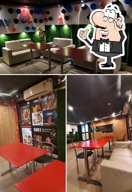 Take a seat at one of the tables at Burger nine